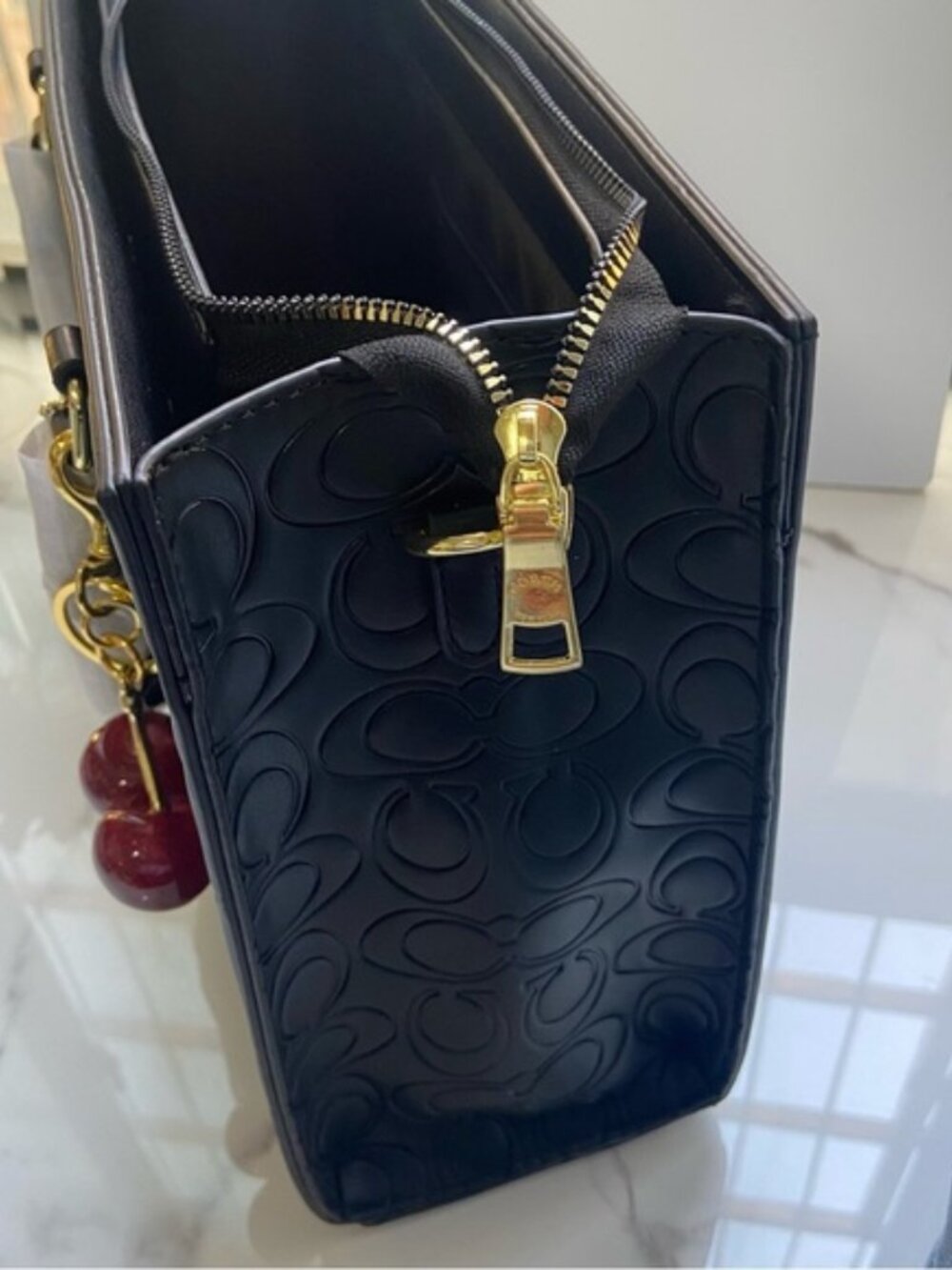 Coach Black Embossed Signature Tote with Cherry Charm - Picture 5 of 5